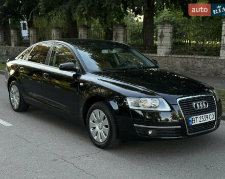 Черный Ауди А6, объемом двигателя 2 л и пробегом 265 тыс. км за 9550 $, фото 2 на Automoto.ua