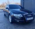 Черный Ауди А6, объемом двигателя 2 л и пробегом 247 тыс. км за 9900 $, фото 1 на Automoto.ua