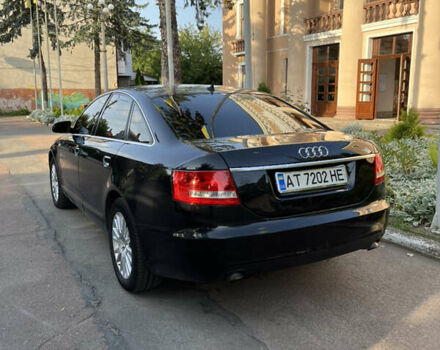 Черный Ауди А6, объемом двигателя 2 л и пробегом 400 тыс. км за 8000 $, фото 1 на Automoto.ua