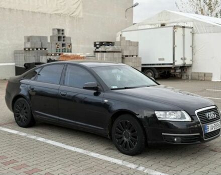 Черный Ауди А6, объемом двигателя 2 л и пробегом 230 тыс. км за 2400 $, фото 1 на Automoto.ua