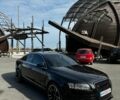 Черный Ауди А6, объемом двигателя 2 л и пробегом 260 тыс. км за 9100 $, фото 1 на Automoto.ua