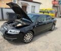Черный Ауди А6, объемом двигателя 1.98 л и пробегом 165 тыс. км за 10350 $, фото 1 на Automoto.ua