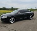 Черный Ауди А6, объемом двигателя 3 л и пробегом 265 тыс. км за 8999 $, фото 1 на Automoto.ua