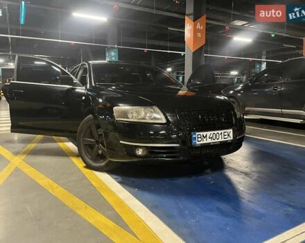 Черный Ауди А6, объемом двигателя 1.97 л и пробегом 303 тыс. км за 7500 $, фото 1 на Automoto.ua