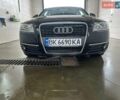 Черный Ауди А6, объемом двигателя 2 л и пробегом 164 тыс. км за 9300 $, фото 1 на Automoto.ua