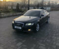 Черный Ауди А6, объемом двигателя 2 л и пробегом 300 тыс. км за 7800 $, фото 1 на Automoto.ua