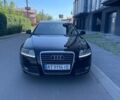 Черный Ауди А6, объемом двигателя 2 л и пробегом 269 тыс. км за 12000 $, фото 1 на Automoto.ua