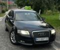 Чорний Ауді А6, об'ємом двигуна 2 л та пробігом 310 тис. км за 7482 $, фото 1 на Automoto.ua