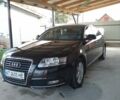Черный Ауди А6, объемом двигателя 2 л и пробегом 196 тыс. км за 12000 $, фото 1 на Automoto.ua