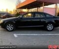 Чорний Ауді А6, об'ємом двигуна 2 л та пробігом 385 тис. км за 9000 $, фото 1 на Automoto.ua