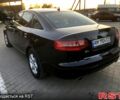 Чорний Ауді А6, об'ємом двигуна 2 л та пробігом 385 тис. км за 9000 $, фото 1 на Automoto.ua