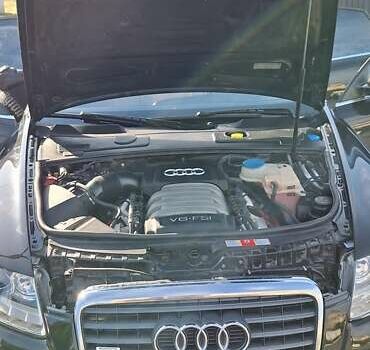 Черный Ауди А6, объемом двигателя 2.8 л и пробегом 252 тыс. км за 6900 $, фото 1 на Automoto.ua