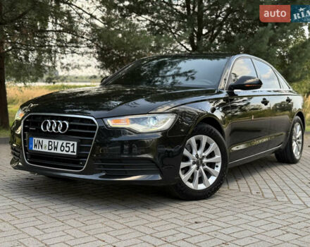 Чорний Ауді А6, об'ємом двигуна 2 л та пробігом 242 тис. км за 13499 $, фото 1 на Automoto.ua