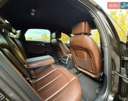 Чорний Ауді А6, об'ємом двигуна 2 л та пробігом 242 тис. км за 13499 $, фото 34 на Automoto.ua