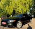 Черный Ауди А6, объемом двигателя 2 л и пробегом 205 тыс. км за 11500 $, фото 1 на Automoto.ua