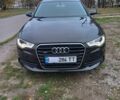 Чорний Ауді А6, об'ємом двигуна 2 л та пробігом 206 тис. км за 11700 $, фото 1 на Automoto.ua