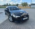 Черный Ауди А6, объемом двигателя 2 л и пробегом 220 тыс. км за 14600 $, фото 1 на Automoto.ua