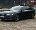 Черный Ауди А6, объемом двигателя 2 л и пробегом 254 тыс. км за 11750 $, фото 1 на Automoto.ua
