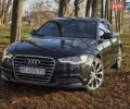 Черный Ауди А6, объемом двигателя 2 л и пробегом 219 тыс. км за 12800 $, фото 1 на Automoto.ua