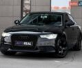 Черный Ауди А6, объемом двигателя 1.98 л и пробегом 220 тыс. км за 13800 $, фото 1 на Automoto.ua