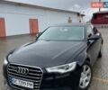 Черный Ауди А6, объемом двигателя 2 л и пробегом 190 тыс. км за 11900 $, фото 1 на Automoto.ua