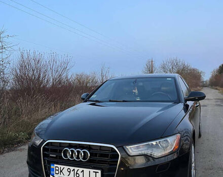 Чорний Ауді А6, об'ємом двигуна 2 л та пробігом 256 тис. км за 13500 $, фото 1 на Automoto.ua