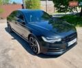 Черный Ауди А6, объемом двигателя 3 л и пробегом 130 тыс. км за 15500 $, фото 1 на Automoto.ua