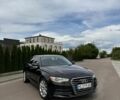 Черный Ауди А6, объемом двигателя 1.98 л и пробегом 223 тыс. км за 12300 $, фото 1 на Automoto.ua