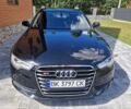 Черный Ауди А6, объемом двигателя 1.98 л и пробегом 300 тыс. км за 11900 $, фото 1 на Automoto.ua