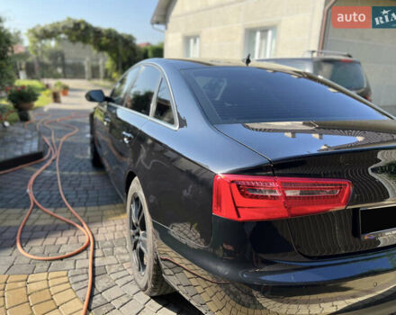 Черный Ауди А6, объемом двигателя 3 л и пробегом 238 тыс. км за 17582 $, фото 1 на Automoto.ua