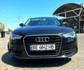 Черный Ауди А6, объемом двигателя 2 л и пробегом 223 тыс. км за 12690 $, фото 1 на Automoto.ua