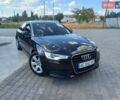 Черный Ауди А6, объемом двигателя 2 л и пробегом 219 тыс. км за 13700 $, фото 1 на Automoto.ua