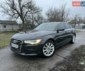 Черный Ауди А6, объемом двигателя 1.98 л и пробегом 248 тыс. км за 12500 $, фото 1 на Automoto.ua