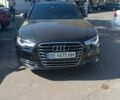 Черный Ауди А6, объемом двигателя 2 л и пробегом 300 тыс. км за 13500 $, фото 1 на Automoto.ua