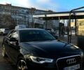 Черный Ауди А6, объемом двигателя 2 л и пробегом 220 тыс. км за 12649 $, фото 1 на Automoto.ua