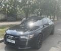 Черный Ауди А6, объемом двигателя 2 л и пробегом 200 тыс. км за 12500 $, фото 1 на Automoto.ua