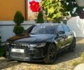 Черный Ауди А6, объемом двигателя 2 л и пробегом 265 тыс. км за 12750 $, фото 1 на Automoto.ua