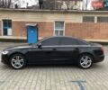 Черный Ауди А6, объемом двигателя 1.98 л и пробегом 205 тыс. км за 17600 $, фото 1 на Automoto.ua