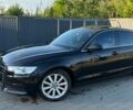 Черный Ауди А6, объемом двигателя 2 л и пробегом 180 тыс. км за 13400 $, фото 1 на Automoto.ua