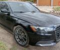 Черный Ауди А6, объемом двигателя 2 л и пробегом 270 тыс. км за 7800 $, фото 1 на Automoto.ua