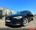 Черный Ауди А6, объемом двигателя 2 л и пробегом 220 тыс. км за 12649 $, фото 1 на Automoto.ua