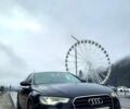 Черный Ауди А6, объемом двигателя 2 л и пробегом 221 тыс. км за 12699 $, фото 1 на Automoto.ua