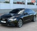 Черный Ауди А6, объемом двигателя 1.98 л и пробегом 192 тыс. км за 13999 $, фото 1 на Automoto.ua