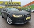 Черный Ауди А6, объемом двигателя 2 л и пробегом 174 тыс. км за 11550 $, фото 1 на Automoto.ua