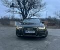 Черный Ауди А6, объемом двигателя 2 л и пробегом 150 тыс. км за 14300 $, фото 1 на Automoto.ua