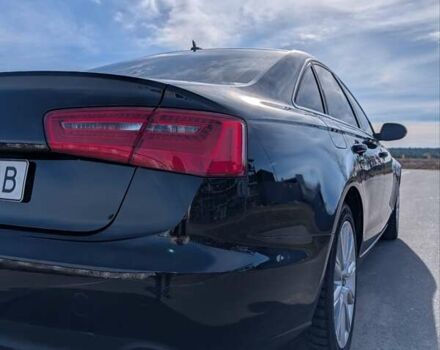 Черный Ауди А6, объемом двигателя 2 л и пробегом 267 тыс. км за 14300 $, фото 1 на Automoto.ua