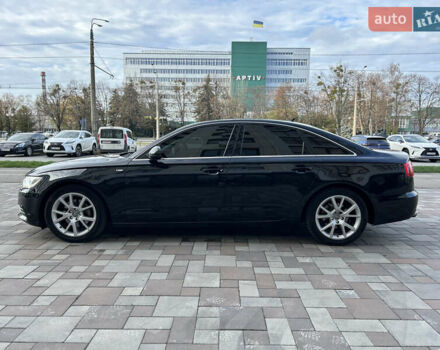 Черный Ауди А6, объемом двигателя 2 л и пробегом 192 тыс. км за 16999 $, фото 2 на Automoto.ua