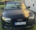 Черный Ауди А6, объемом двигателя 2 л и пробегом 300 тыс. км за 10772 $, фото 1 на Automoto.ua