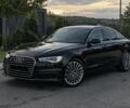 Черный Ауди А6, объемом двигателя 2 л и пробегом 227 тыс. км за 13694 $, фото 1 на Automoto.ua