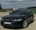 Чорний Ауді А6, об'ємом двигуна 2 л та пробігом 261 тис. км за 12700 $, фото 1 на Automoto.ua